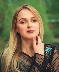 A Woman With a Black Color Top Portrait Image