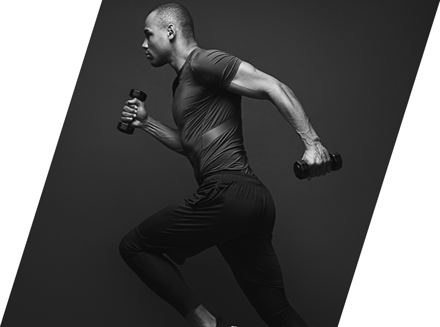 A Man in Dark Color Athleisure on a Black Background