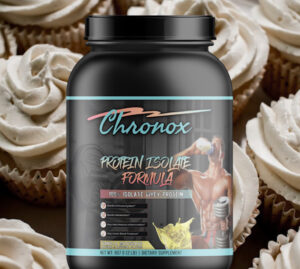A Protein Powder Box in Black on a cupcake Background